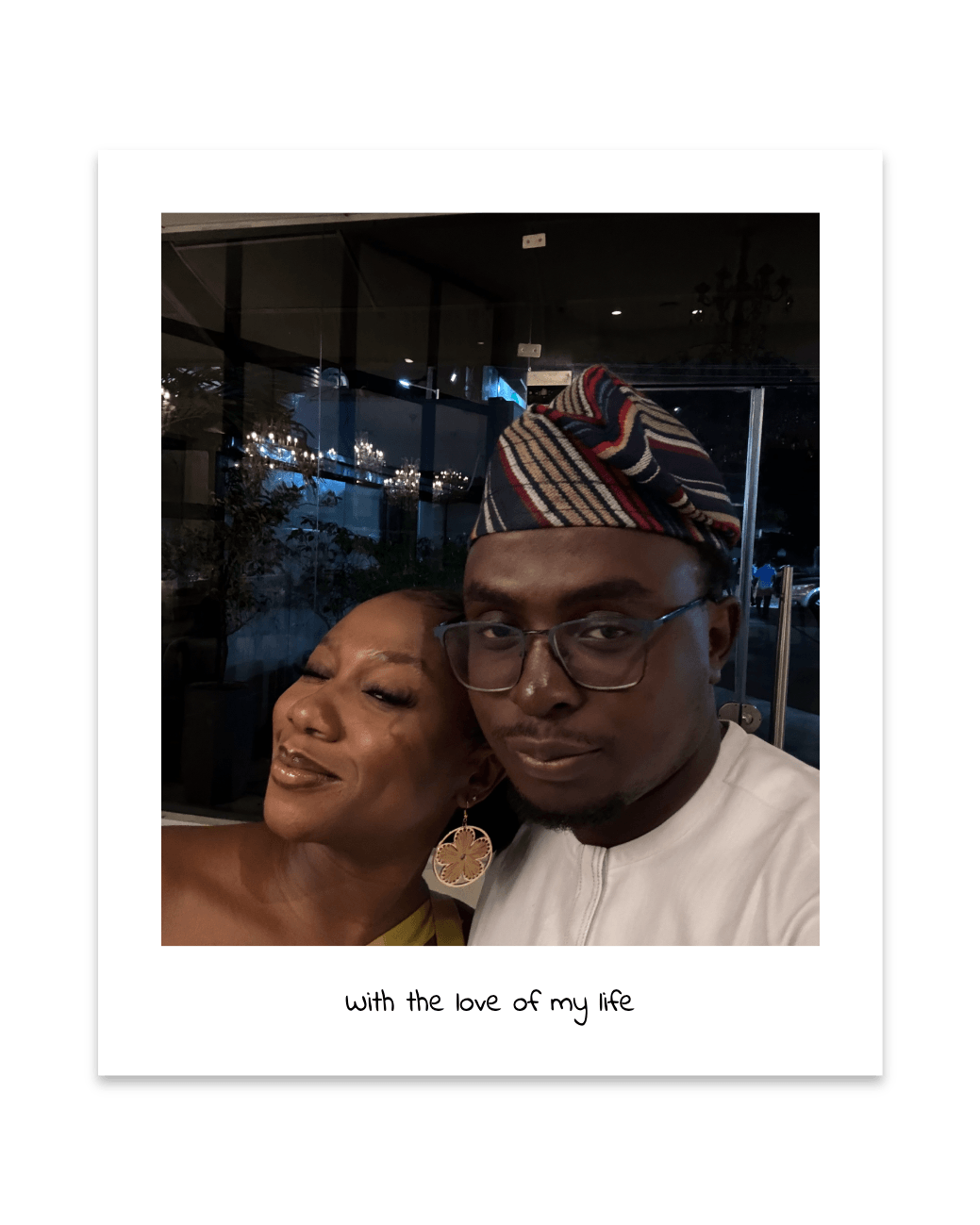 Pelumi and his partner wearing Nigerian attire