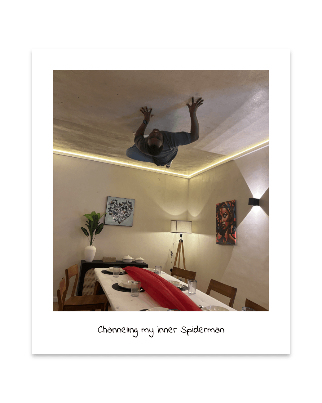 Pelumi posing in an upside down room